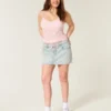 Letvasket mini-skort i denim med snørebånd Letvasket mini-skort i denim med snørebånd