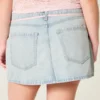 Letvasket mini-skort i denim med snørebånd Letvasket mini-skort i denim med snørebånd