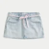 Letvasket mini-skort i denim med snørebånd Letvasket mini-skort i denim med snørebånd