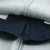 Letvasket mini-skort i denim med snørebånd Letvasket mini-skort i denim med snørebånd