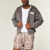 Løse fleece-shorts i camouflage til midt på låret Løse fleece-shorts i camouflage til midt på låret