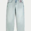 Lys vask Skaterbaggyjeans med spillekortgrafik Lys vask Skaterbaggyjeans med spillekortgrafik