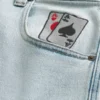Lys vask Skaterbaggyjeans med spillekortgrafik Lys vask Skaterbaggyjeans med spillekortgrafik