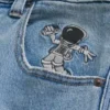 Lysvasket astronaut-grafik Superbaggy jeans Lysvasket astronaut-grafik Superbaggy jeans