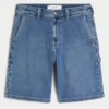 Mediumvaskede, løse malershorts i denim Mediumvaskede, løse malershorts i denim
