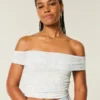 Mesh-top med foldede skuldre Mesh-top med foldede skuldre
