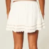 Mini-skort med blondekant Mini-skort med blondekant