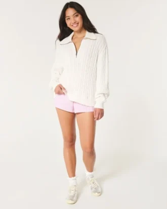 Oversized kabelstrikket sweater med halv lynlås