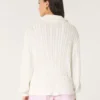 Oversized kabelstrikket sweater med halv lynlås