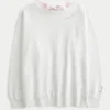 Oversized sweatshirt med sløjfe på ryggen fra årgang ’26 Oversized sweatshirt med sløjfe på ryggen fra årgang ’26