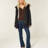 Parka med imiteret pelsfor Parka med imiteret pelsfor
