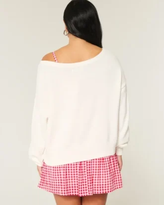 Slouchy off-shoulder sweater med flag- og hjerteprint