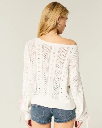 Strikket sweater med sløjfeærmer