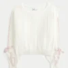 Strikket sweater med sløjfeærmer