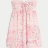 Stropløs babydoll-minikjole med flæser Stropløs babydoll-minikjole med flæser