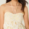 Stropløs babydoll-minikjole med flæser Stropløs babydoll-minikjole med flæser