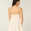 Stropløs babydoll-minikjole med flæser Stropløs babydoll-minikjole med flæser