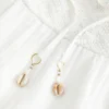 Stropløs babydoll-minikjole med kroget overdel Stropløs babydoll-minikjole med kroget overdel