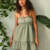 Stropløs broderet babydoll-kjole Stropløs broderet babydoll-kjole