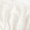 Stropløs broderet babydoll-kjole
