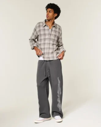 Superbaggy sweatpants med dobbelt flamme-grafik