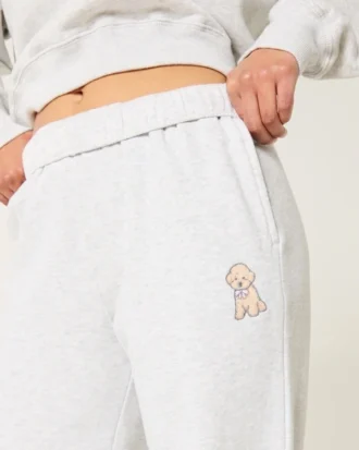 Sweatpants med bred benvidde og hundemotiv