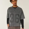 Tung baggy kort fodbold-T-shirt med grafisk print Tung baggy kort fodbold-T-shirt med grafisk print