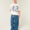 Tung baggy kort fodbold-T-shirt med grafisk print Tung baggy kort fodbold-T-shirt med grafisk print