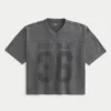 Tung baggy kort fodbold-T-shirt med grafisk print Tung baggy kort fodbold-T-shirt med grafisk print