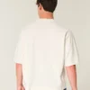 Tung baggy kort fodbold-T-shirt med grafisk print Tung baggy kort fodbold-T-shirt med grafisk print
