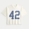 Tung baggy kort fodbold-T-shirt med grafisk print Tung baggy kort fodbold-T-shirt med grafisk print