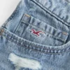 Ultra lavtaljede broderede denim-minishorts Ultra lavtaljede broderede denim-minishorts
