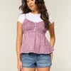 Ultra lavtaljede mini-shorts i distressed medium wash denim Ultra lavtaljede mini-shorts i distressed medium wash denim