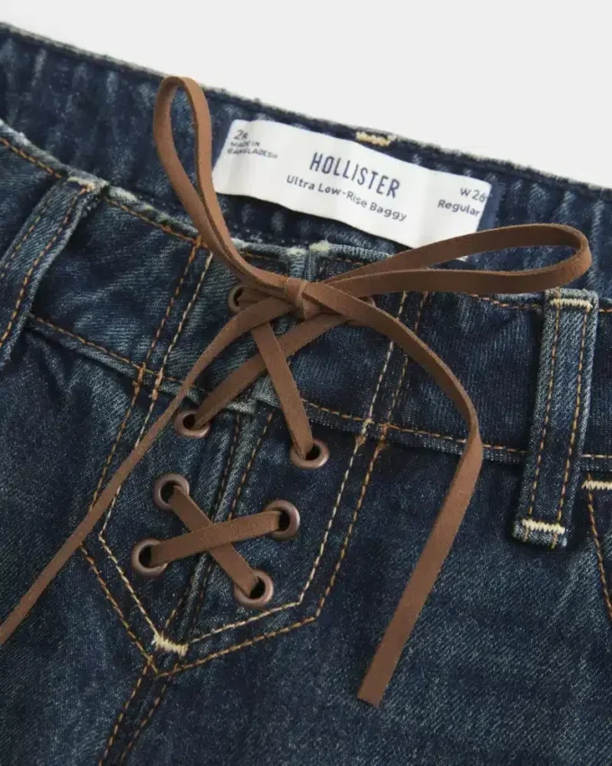 Ultra lavtaljede, mørkvaskede baggy jeans med snørebånd Ultra lavtaljede, mørkvaskede baggy jeans med snørebånd