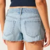 Ultra lavtaljede, rippede mini-denimshorts i medium vask Ultra lavtaljede, rippede mini-denimshorts i medium vask