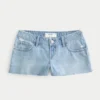 Ultra lavtaljede, rippede mini-denimshorts i medium vask Ultra lavtaljede, rippede mini-denimshorts i medium vask