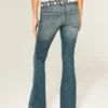 Ultra lavtaljet broderet bælte Mediumvaskede flare jeans Ultra lavtaljet broderet bælte Mediumvaskede flare jeans