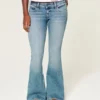 Ultra lavtaljet flare-jeans i medium vask Ultra lavtaljet flare-jeans i medium vask