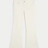 Ultra lavtaljet hvid broderet flare-jeans med lommer Ultra lavtaljet hvid broderet flare-jeans med lommer