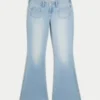 Ultra lavtaljet lysvasket flare-jeans med forlommer Ultra lavtaljet lysvasket flare-jeans med forlommer