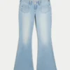Ultra lavtaljet lysvasket flare-jeans med forlommer Ultra lavtaljet lysvasket flare-jeans med forlommer