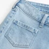 Ultra lavtaljet lysvasket flare-jeans med forlommer Ultra lavtaljet lysvasket flare-jeans med forlommer