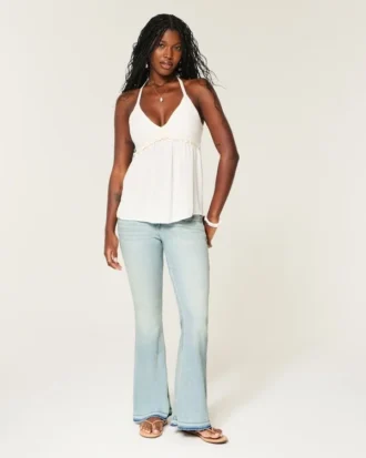 Ultra lavtaljet lysvasket flare jeans med nedadgående kant Ultra lavtaljet lysvasket flare jeans med nedadgående kant