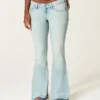 Ultra lavtaljet lysvasket flare jeans med nedadgående kant Ultra lavtaljet lysvasket flare jeans med nedadgående kant