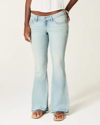 Ultra lavtaljet lysvasket flare jeans med nedadgående kant Ultra lavtaljet lysvasket flare jeans med nedadgående kant