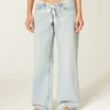 Ultra lavtaljet lysvasket mini-taljebånd Shoelace baggy jeans Ultra lavtaljet lysvasket mini-taljebånd Shoelace baggy jeans