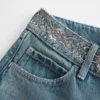 Ultra lavtaljet, mediumvasket, broderet baggy jeans Ultra lavtaljet, mediumvasket, broderet baggy jeans