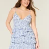 V-hals babydoll-minikjole med flæser V-hals babydoll-minikjole med flæser