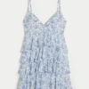 V-hals babydoll-minikjole med flæser V-hals babydoll-minikjole med flæser