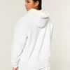 Vendbar fleece-hoodie med lynlås og kunstig pelsforing Vendbar fleece-hoodie med lynlås og kunstig pelsforing